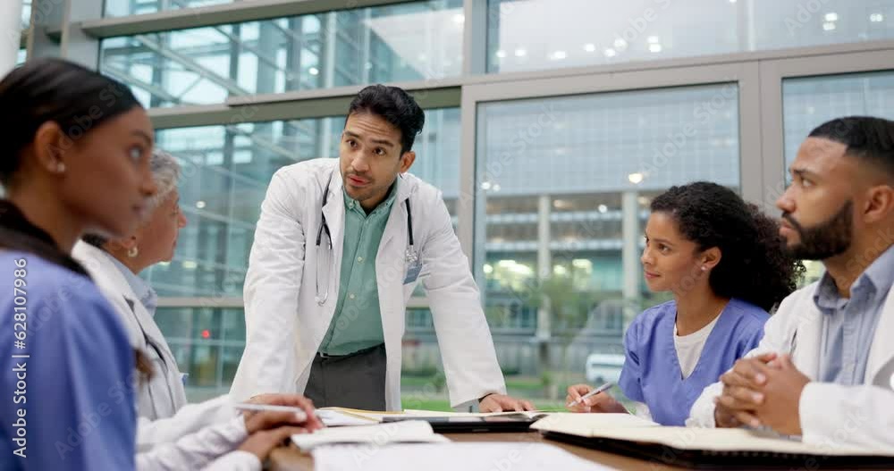 Doctor, team meeting and man with management for medical and healthcare group in office. Leadership, working and communication of hospital and clinic with planning for professional collaboration
