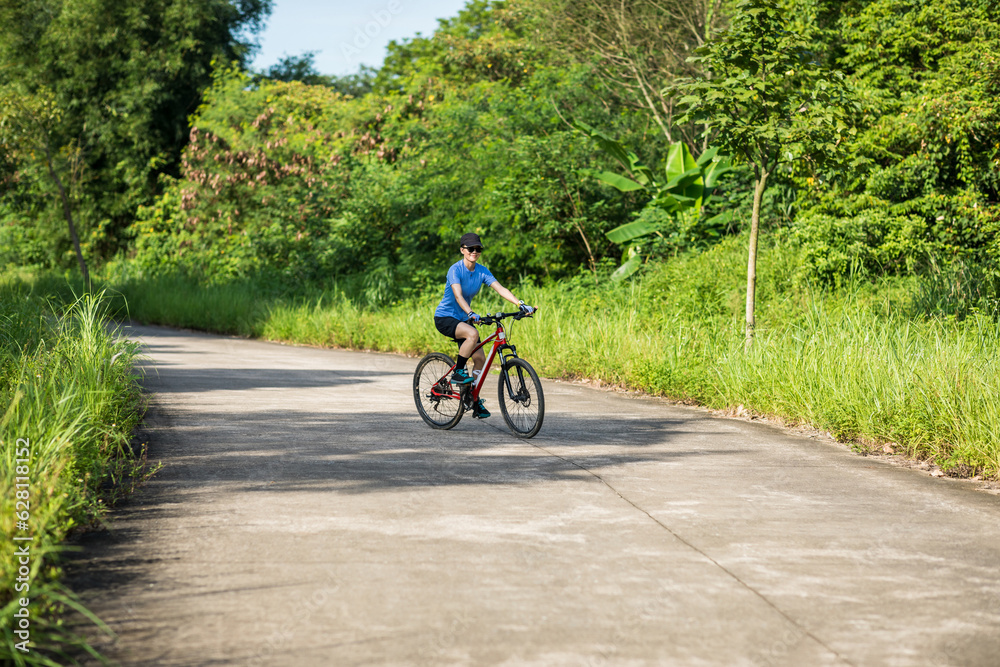 Riding bike in spring forest