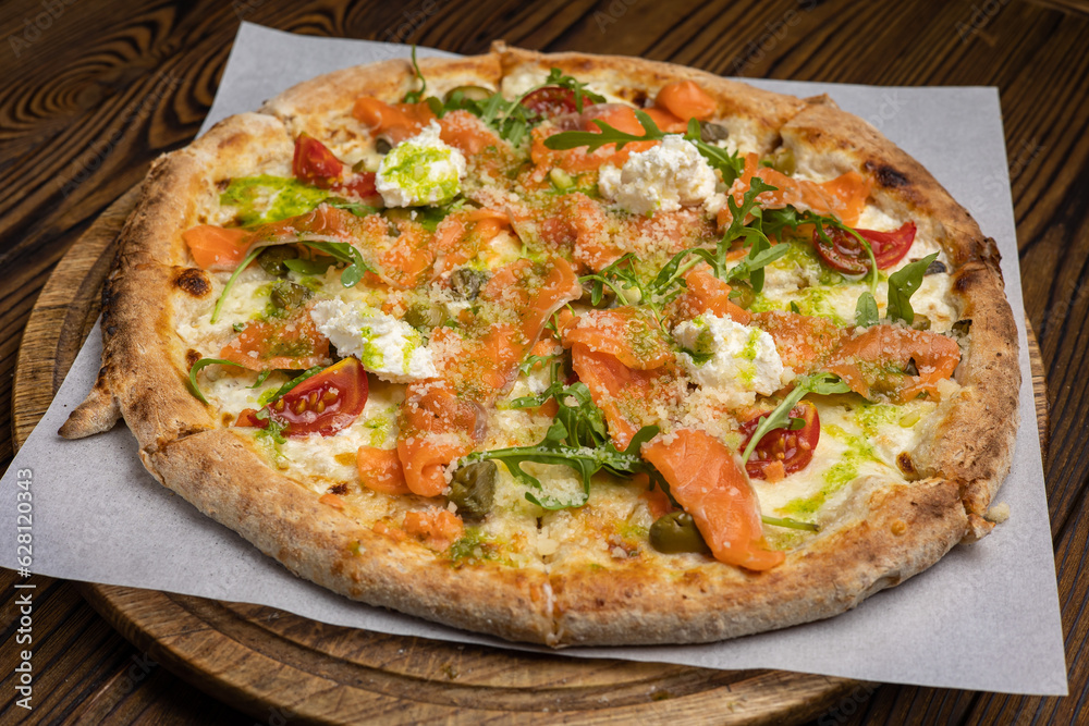 Delicious Italian pizza in the restaurant Delicious Italian pizza in the restaurant