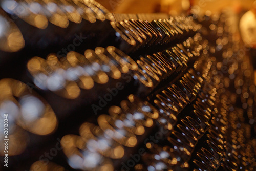 Artistic shot for bottles of vine in wine cellar in Italy