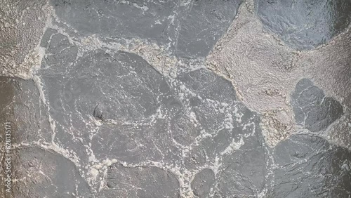 Biological purification water sewage treatment plant waste water bubbles in the tank, activated sludge industrial wastewaters process using aeration and biology floc composed protozoa and bacteria