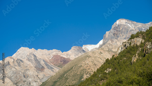 rocky mountain peaks. summer green mountains © Daniil_98_03_09