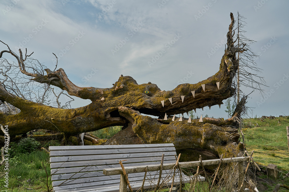 ree trunk turned into a dragon.