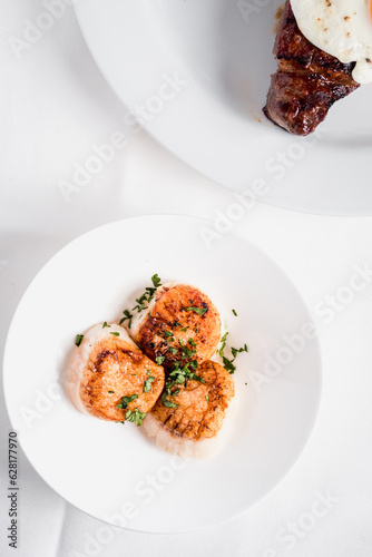 Overhead photo of scallops on a plate