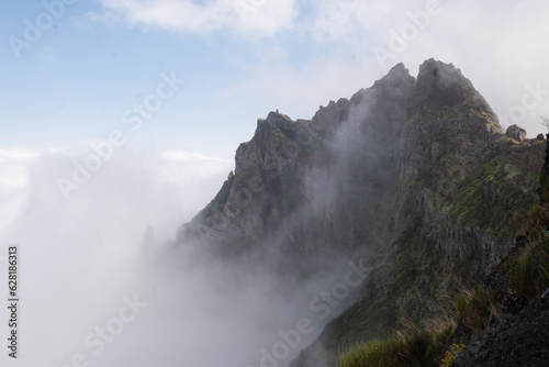 Aerial drone view over the foggy mist on the mountain tops of Madeira
