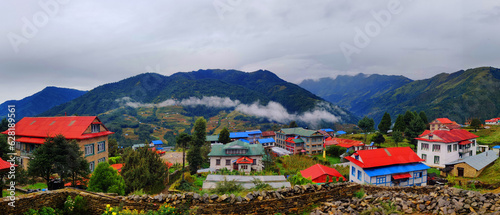 Village view of Solukhumbu Nepal. Koshi Province of eastern Nepal. Village in the mountains. Solukhumbu consists of the subregions Solu and Khumbu. Panorama View. photo