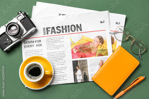 Newspapers with cup of coff...