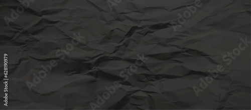 Black creased crumpled paper texture can be use as background. Ragged black Paper. black waxed packing paper texture. 