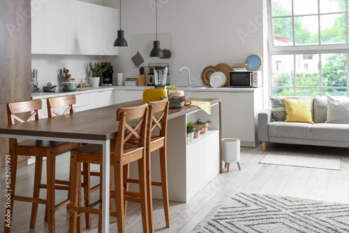 Interior of light kitchen w...