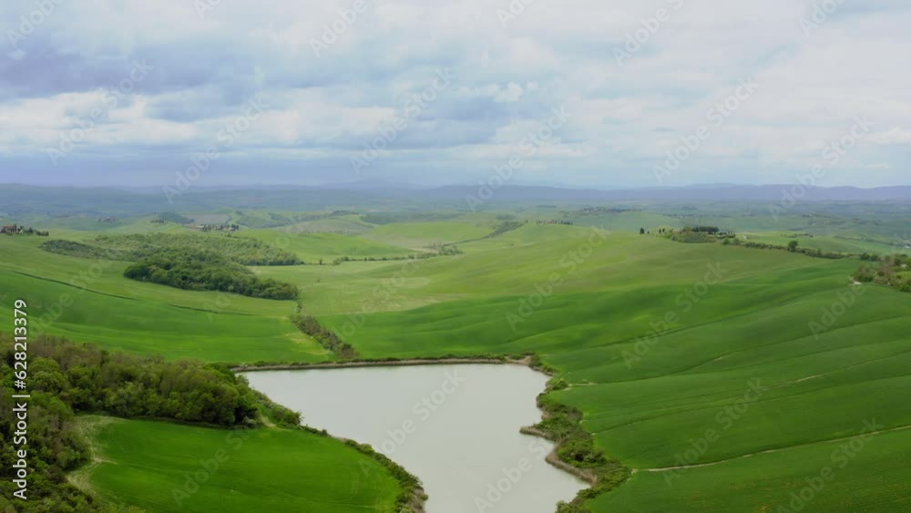 Aerial view of green fields in spring in Tuscany Italy
