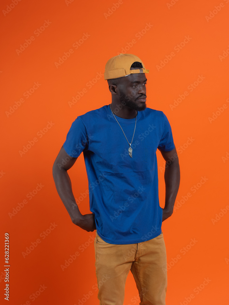 Confident African American with cap in studio shot Confident African American with cap in studio shot