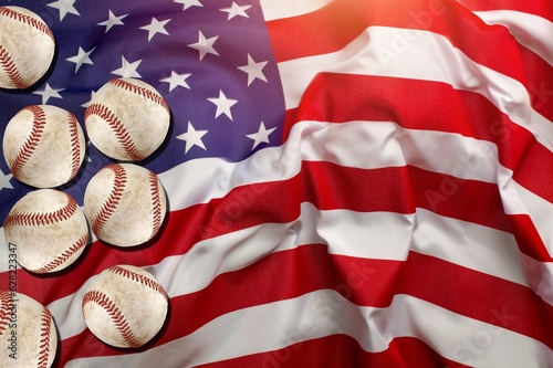 Old baseballs and United States blue and red flag