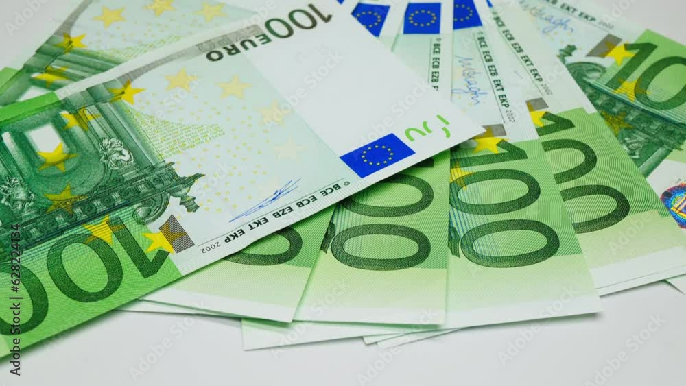 Hands count euro banknotes. Male hands counting a stack of hundred Euro EU banknotes. Close-up. A businessman is counting cash. The concept of investment. Money exchange. Finance business concept Hands count euro banknotes. Male hands counting a stack of hundred Euro EU banknotes. Close-up. A businessman is counting cash. The concept of investment. Money exchange. Finance business concept