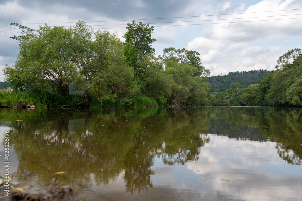 River landscape - The river Eder in a green landscape River landscape - The river Eder in a green landscape