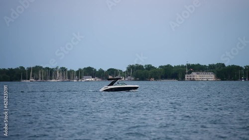 Speedboat Glides Across Lake (Toronto Islands, Canada) photo