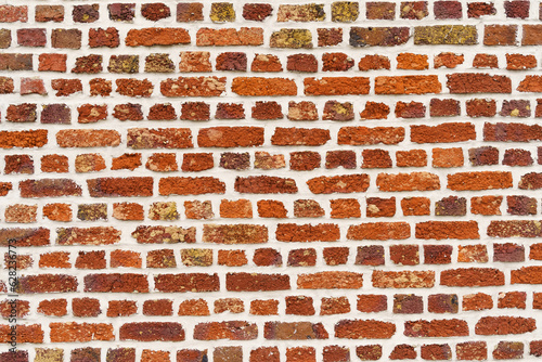 Old red brick wall. Texture of a brick wall