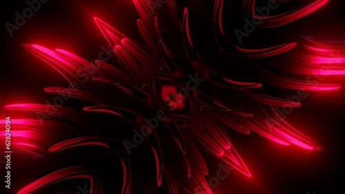 Spinning object with neon thorns on a black background. Design. Abstract blades with sharp tips. photo