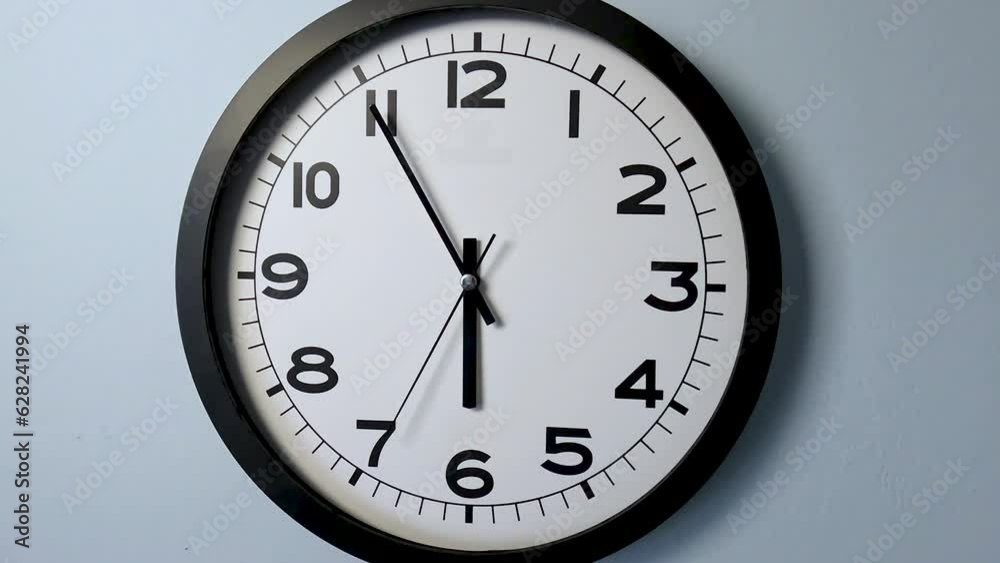custom made wallpaper toronto digitalCloseup of White Clock Face on white wall clock, arrows show 6:00 or 00:00