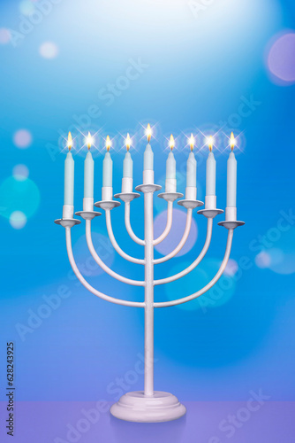 Jewish Hanukkah Menorah 9 Branch Candlestick. Holiday Candle Holder. Nine-arm candlestick. Traditional Hebrew Festival of Lights candelabra. Background for design with copy space