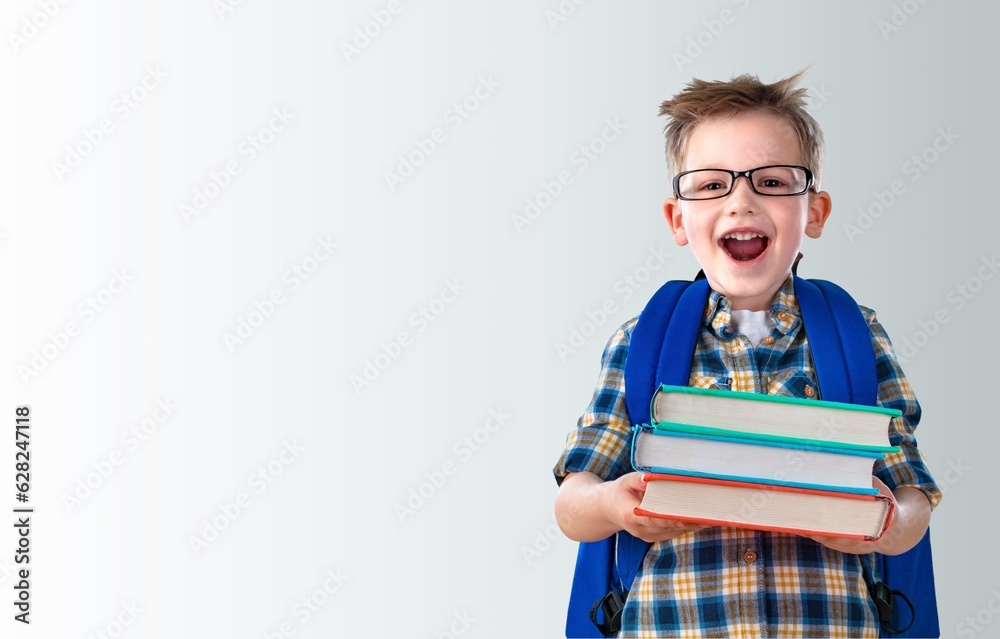 adorable happy student holding books for study adorable happy student holding books for study