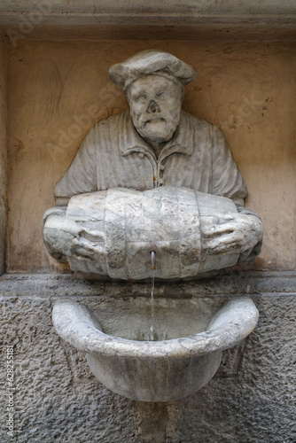 Rome, Italy - 26 Nov, 2022: Fontana del Facchino - Fountain of the Laborer - by Jacopo Del dating back to 1580 photo