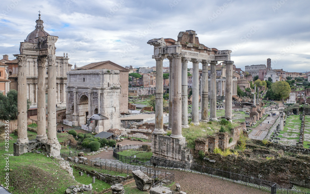 Rome, Italy - 27 Nov, 2022: The Temple of Saturn and views along the Roman Forum