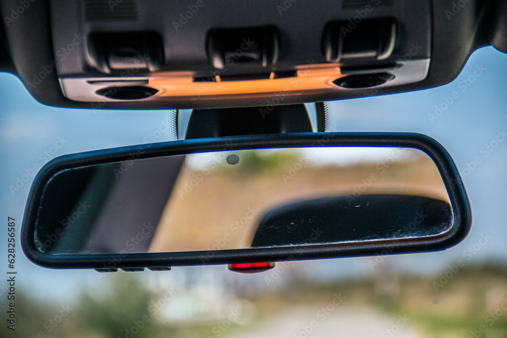 Close-up rearview mirror in car interior