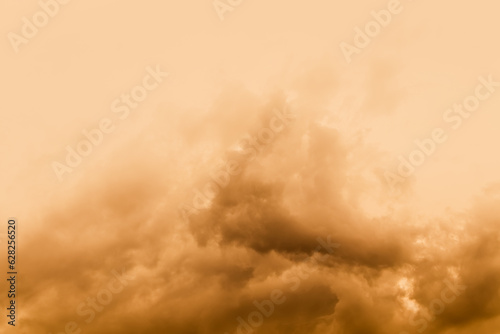 A large storm formed, powdered dust and sand on the ground were blown into the clouds, causing the orange glow to look horrible. extreme weather events. photo