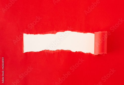 Red torn paper. Burst hole background. Minimal abstract colorful wallpaper concept.