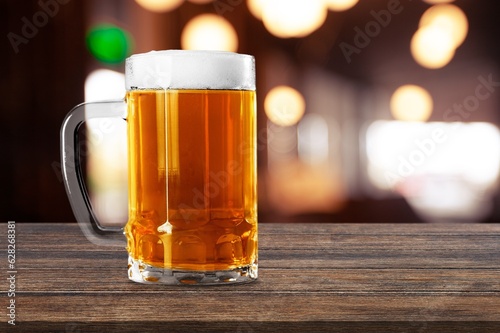 Two glasses with beer in bar, drink concept