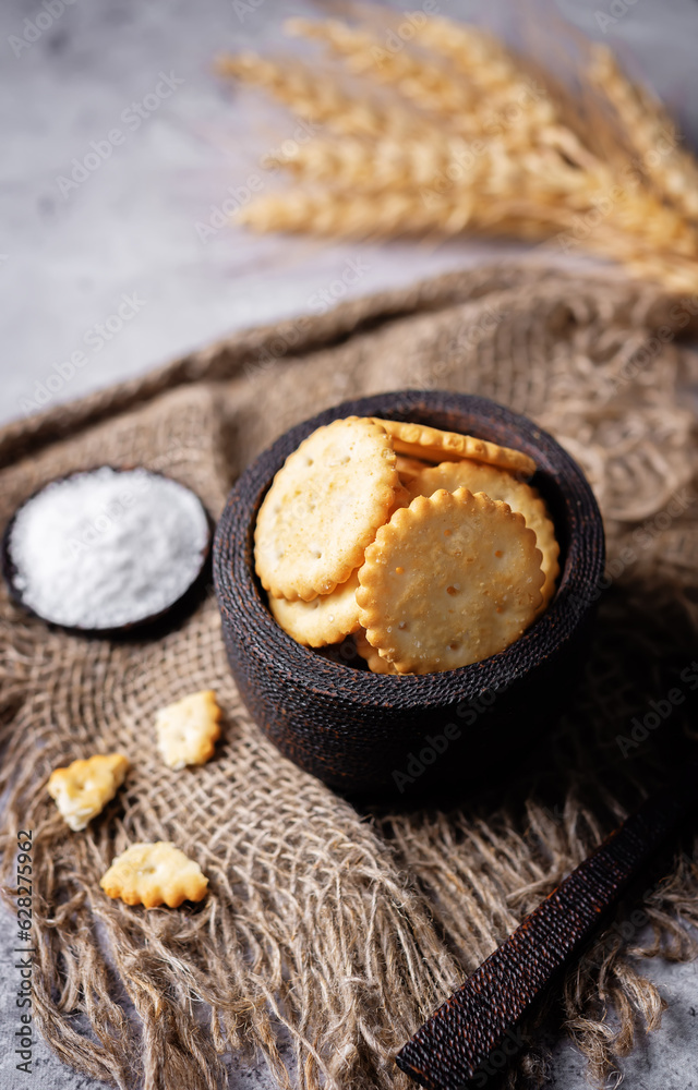 Graham cracker with salt on a white isolated background Graham cracker with salt on a white isolated background