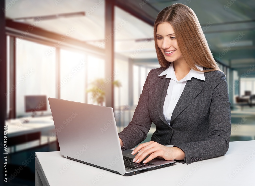 Beautiful Young female Manager works on computer, AI generated image Beautiful Young female Manager works on computer, AI generated image
