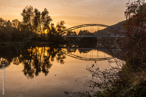 Fototapeta Naklejka Na Ścianę i Meble -  Bridge over Berounka river in Karlstejn village, Czech Republic