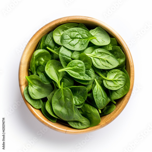 Top-down view of a bowl of baby spinach.