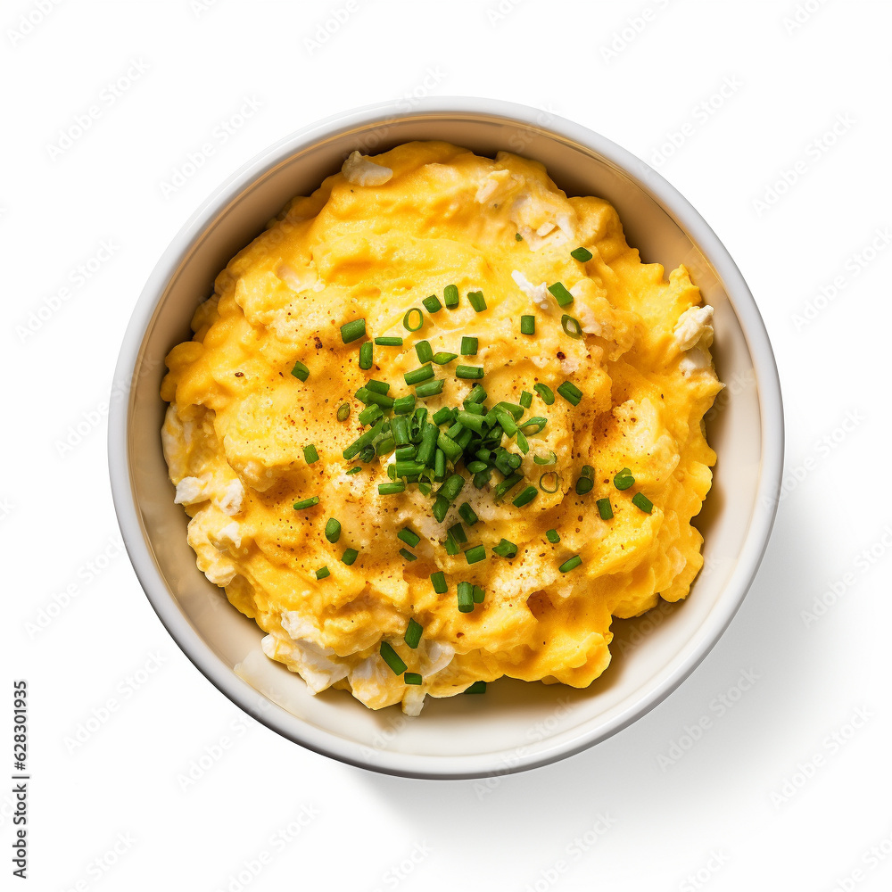 Top-down view of a bowl of scrambled eggs.