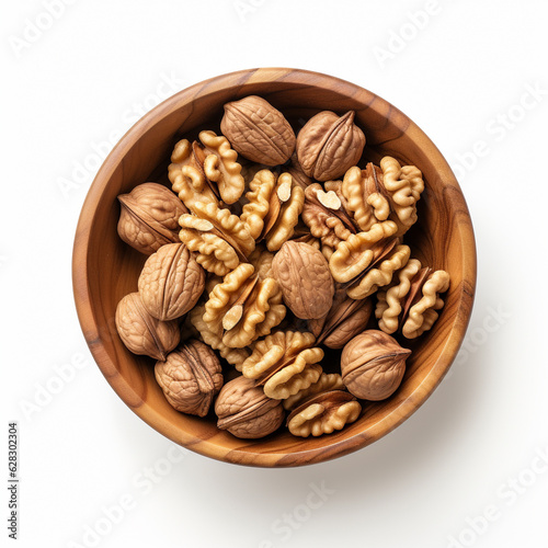 Top-down view of a bowl of walnuts.