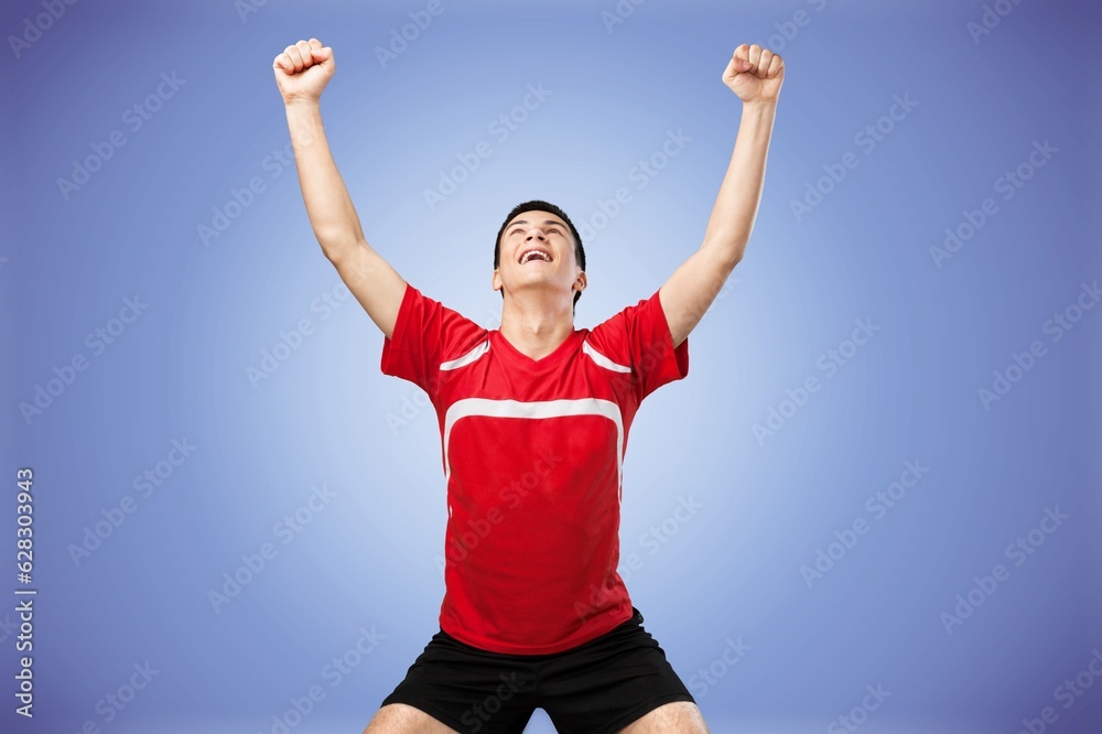 Portrait of young happy man football player with ball Portrait of young happy man football player with ball