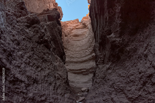 The sheer cliff of a dry waterfall at the end of a slot canyon in Paria Canyon at Glen Canyon Recreation Area Arizona. photo