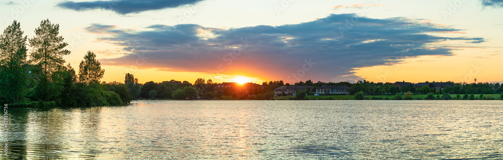 Furzton lake panorama at sunset in Milton Keynes. England	
