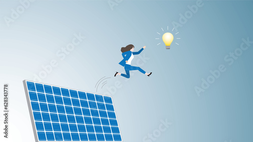 Reach target, goal, and success concept. Businesswoman jumps from solar cells. to grab a light bulb. ESG challenge for Renewable, Alternative, Green energy, Sustainable Environmental policy, Net zero.