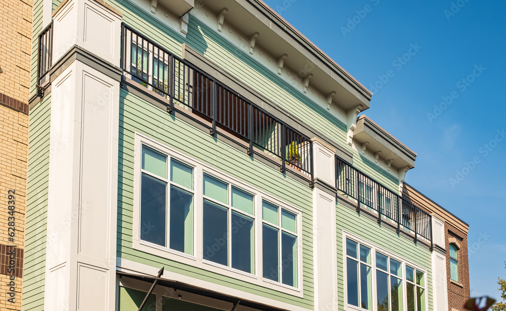 Apartments building against blue sky. Residential townhouses. Modern apartment buildings in BC Canada