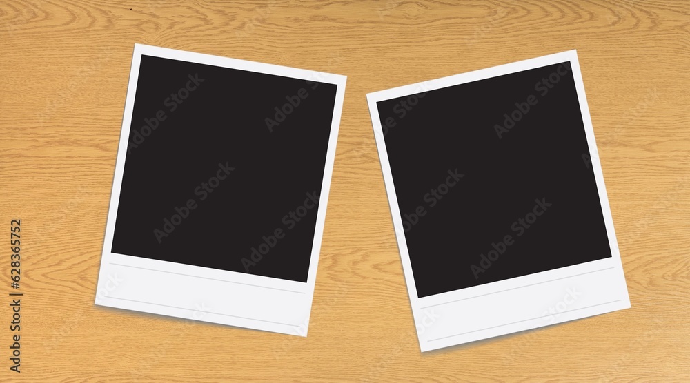 Two Blank retro instant photo frame on desk Two Blank retro instant photo frame on desk