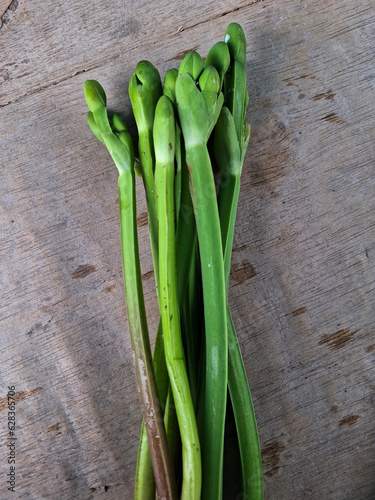 This plant is a vegetable. the local name is Vegetable Genjer. usually live in the water. These leaves can be made good food. Close-up.
 photo