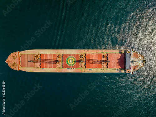 Aerial top view of Bulk Carrier Ship  freight transport in import export and business logistic  © marchello74
