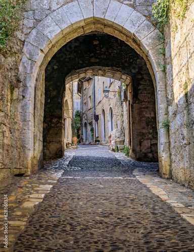 Arched passage way in the traditional medieval stone city walls of the Old Town  Vieille Ville in Saint Paul de Vence  French Riviera  South of France