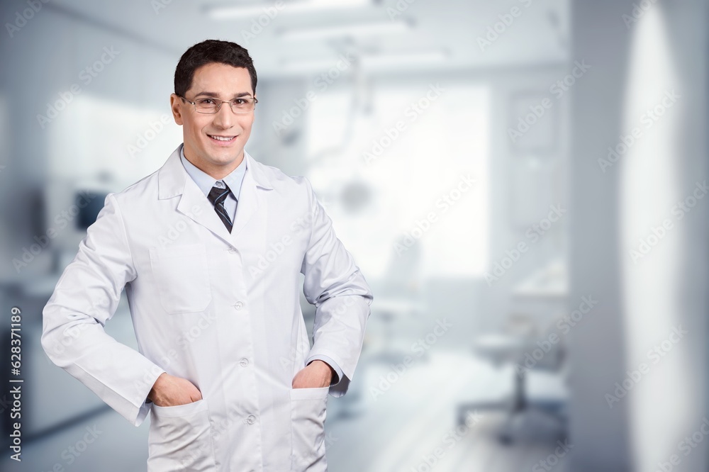 Cheerful confident male therapist in coat Cheerful confident male therapist in coat