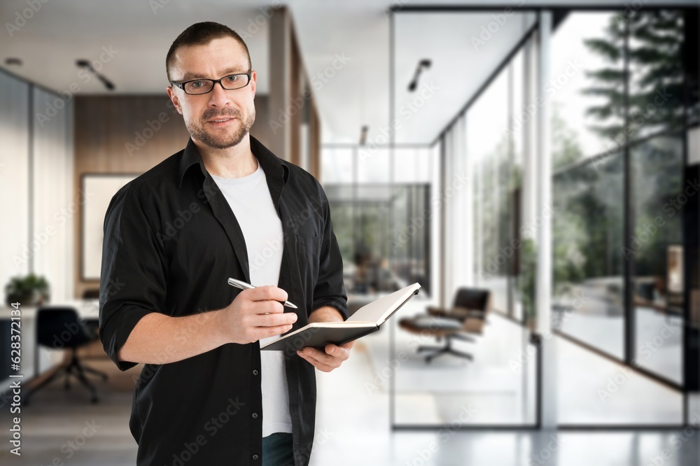Handsome young businessman works in the office, AI generated image Handsome young businessman works in the office, AI generated image