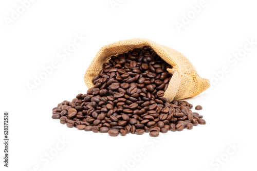 Heap of brown roasted coffee beans in burlap bags isolated on white background. fresh coffee beans concept