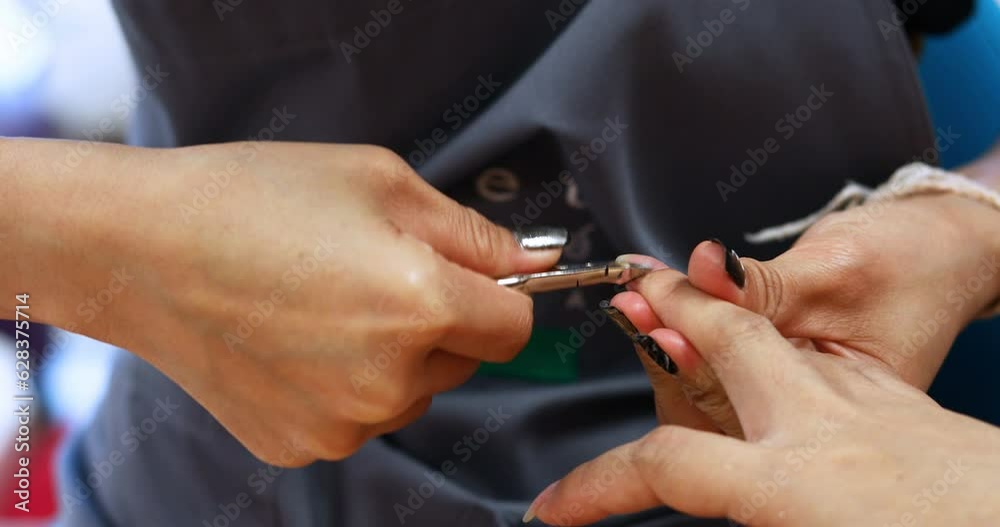 manicure artist making nail polishing with tools at beauty salon manicure artist making nail polishing with tools at beauty salon