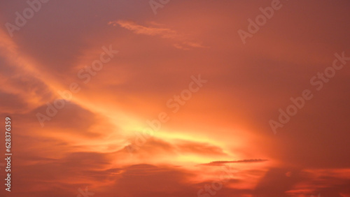 The twilight sky is orange.